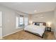 Bright bedroom featuring a window seat, a platform bed, and neutral decor for a cozy atmosphere at 3011 N New Jersey St, Indianapolis, IN 46205