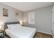 Cozy bedroom with a gray headboard, matching side tables, and a peaceful ambiance, perfect for relaxation at 3011 N New Jersey St, Indianapolis, IN 46205