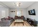 Bright living room with wood-look floors, neutral walls, and stylish decor, creating a comfortable space at 3011 N New Jersey St, Indianapolis, IN 46205