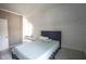 Bedroom showcasing carpet, one full bed, an accent wall, and a window seat at 307 E 5Th St, Sheridan, IN 46069