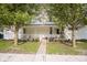Charming home with a welcoming front porch, surrounded by mature trees, offers curb appeal at 307 E 5Th St, Sheridan, IN 46069
