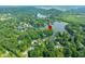 Picturesque aerial view of a lakefront community surrounded by lush forests and scenic landscapes at 3695 Windsor Pl, Martinsville, IN 46151