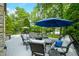 Spacious backyard deck area with comfortable seating and outdoor dining options at 3695 Windsor Pl, Martinsville, IN 46151