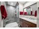 Modern bathroom showcasing a glass-enclosed shower, sleek vanity, and elegant fixtures at 3695 Windsor Pl, Martinsville, IN 46151