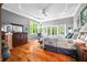 Beautiful bedroom with tray ceilings, natural light, and hardwood floors at 3695 Windsor Pl, Martinsville, IN 46151