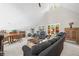 Bright and airy bonus room with vaulted ceilings, comfortable seating, and natural light streaming through the windows at 3695 Windsor Pl, Martinsville, IN 46151