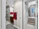Hallway leads to a modern bathroom with a glass shower and a cherry vanity at 3695 Windsor Pl, Martinsville, IN 46151