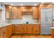 Gourmet kitchen with stainless steel appliances, granite countertops and wooden cabinets at 3695 Windsor Pl, Martinsville, IN 46151