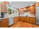 Well appointed kitchen featuring stainless steel appliances, wood cabinets and granite countertops at 3695 Windsor Pl, Martinsville, IN 46151