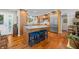 Well-equipped kitchen with granite countertops, stainless steel appliances, and a functional center island at 3695 Windsor Pl, Martinsville, IN 46151