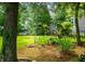 Lush front yard featuring vibrant plants and a beautiful view of the charming home at 3695 Windsor Pl, Martinsville, IN 46151