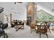 Living room features cathedral ceilings, a stone fireplace, and a loft overlooking the downstairs at 3695 Windsor Pl, Martinsville, IN 46151