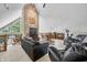 Comfortable living room with stone fireplace, vaulted ceiling, and view of loft at 3695 Windsor Pl, Martinsville, IN 46151