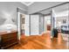 Hardwood floors, neutral paint, and crisp white trim throughout this living space create an inviting and elegant interior at 3695 Windsor Pl, Martinsville, IN 46151