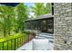 Charming outdoor patio with stone wall and view of the lake at 3695 Windsor Pl, Martinsville, IN 46151