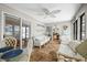 Charming sunroom filled with light and comfortable wicker seating, perfect for relaxation and entertaining at 3695 Windsor Pl, Martinsville, IN 46151
