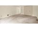 Bedroom featuring neutral carpeting and white walls with ample closet space at 3714 Timberview Ct, Anderson, IN 46011