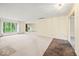 Spacious living area with a large window for natural light and hardwood flooring at 3714 Timberview Ct, Anderson, IN 46011