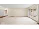 Bright living room with a large window for natural light and hardwood flooring at 3714 Timberview Ct, Anderson, IN 46011