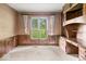 Cozy office with built-in shelving, drawers, and a view of the outdoors at 3714 Timberview Ct, Anderson, IN 46011
