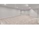 Expansive finished basement with carpeted flooring and recessed lighting at 4416 Eaglecrest Pl, Zionsville, IN 46077