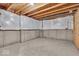 Unfinished basement featuring concrete flooring and partially insulated walls at 4416 Eaglecrest Pl, Zionsville, IN 46077