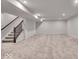 Basement area with carpeted flooring, stairwell access and recessed lights at 4416 Eaglecrest Pl, Zionsville, IN 46077