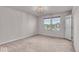 Bedroom featuring neutral carpet, a chandelier, and a window with blinds at 4416 Eaglecrest Pl, Zionsville, IN 46077