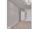 Bedroom with neutral carpet, a modern ceiling light, and white doors at 4416 Eaglecrest Pl, Zionsville, IN 46077