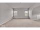 Spacious bedroom with neutral carpet and two windows providing natural light at 4416 Eaglecrest Pl, Zionsville, IN 46077