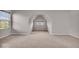 Large bonus room featuring neutral carpet and lots of natural light at 4416 Eaglecrest Pl, Zionsville, IN 46077