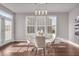 Bright dining area featuring hardwood floors and lots of natural light at 4416 Eaglecrest Pl, Zionsville, IN 46077