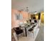 Cozy dining room with modern table, stylish chairs and view of kitchen at 5011 Amber Creek Pl # 205, Indianapolis, IN 46237