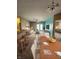 Open-concept living space with stylish furniture, dining area, and lots of natural light at 5011 Amber Creek Pl # 205, Indianapolis, IN 46237