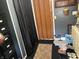 Hallway featuring an folding door, black-out curtains and plenty of storage for shoes and accessories at 5091 Alexandria Pike, Anderson, IN 46012