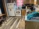 Well-lit kitchen featuring stainless steel appliances, wood cabinets and durable wood look flooring at 5091 Alexandria Pike, Anderson, IN 46012