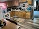 Bright kitchen with lots of natural light with warm wood cabinets and modern stainless steel appliances at 5091 Alexandria Pike, Anderson, IN 46012