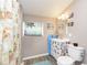 Charming bathroom with unique vanity, beach themed decorations, and coastal vibes at 5110 S State Ave, Indianapolis, IN 46227