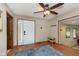 Inviting foyer with hardwood floors, ceiling fan, and stylish rug, creating a warm and welcoming entrance at 5110 S State Ave, Indianapolis, IN 46227