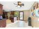 Bright kitchen with dark cabinetry features a center island with sink, and lots of space at 5110 S State Ave, Indianapolis, IN 46227