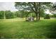 Spacious backyard with a storage shed, offering practicality and ample space for outdoor enjoyment at 5116 W County Road 450 S, Coatesville, IN 46121