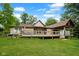 Expansive backyard featuring a large deck perfect for entertaining and outdoor living at 5116 W County Road 450 S, Coatesville, IN 46121