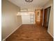 Bedroom featuring a built in bed frame with ladder access, laminate flooring and neutral colored walls at 5116 W County Road 450 S, Coatesville, IN 46121