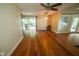 A living room displays recessed lights, windows, and sliding glass doors providing natural light and outdoor access at 5116 W County Road 450 S, Coatesville, IN 46121