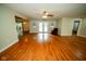 The living room has wood floors and French doors that lead to the outside, creating a bright and airy atmosphere at 5116 W County Road 450 S, Coatesville, IN 46121