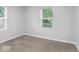 Carpeted bedroom with window at 5136 Miller St, Indianapolis, IN 46241