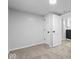 Carpeted bedroom with window and double door closet at 5136 Miller St, Indianapolis, IN 46241