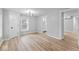 Bright living room featuring beautiful floors, neutral paint, and lots of windows at 5136 Miller St, Indianapolis, IN 46241