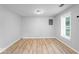 Spacious living room featuring beautiful floors and neutral paint at 5136 Miller St, Indianapolis, IN 46241