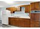 Practical kitchen with ample cabinets, white appliances, and plenty of counter space for cooking at 5236 Daniel Dr, Indianapolis, IN 46226
